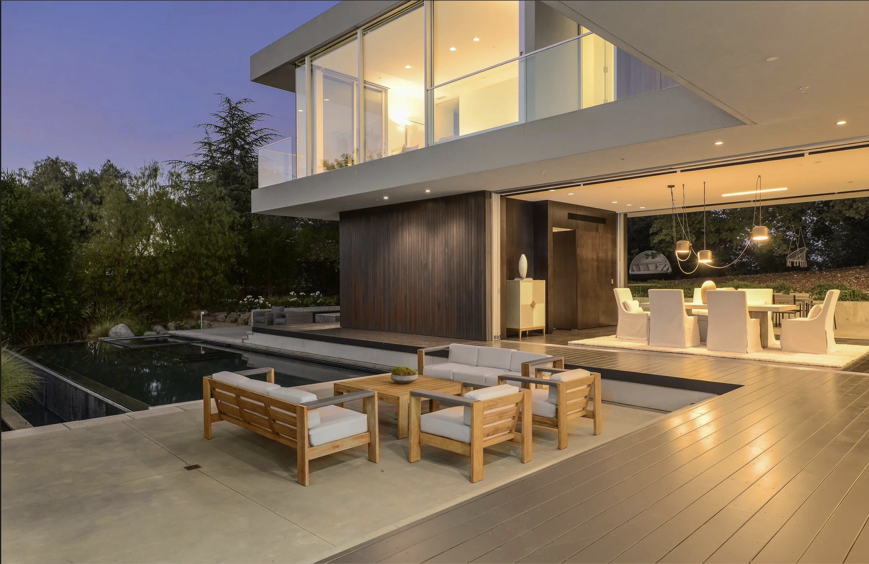 Considered outdoor furniture on a modern architectural terrace